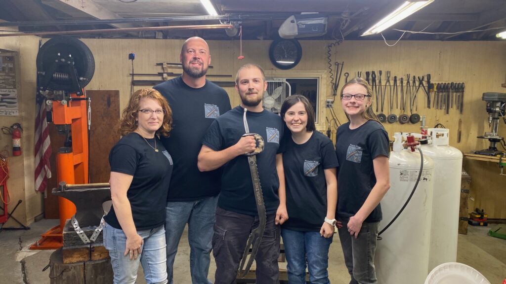 Family with forged sword